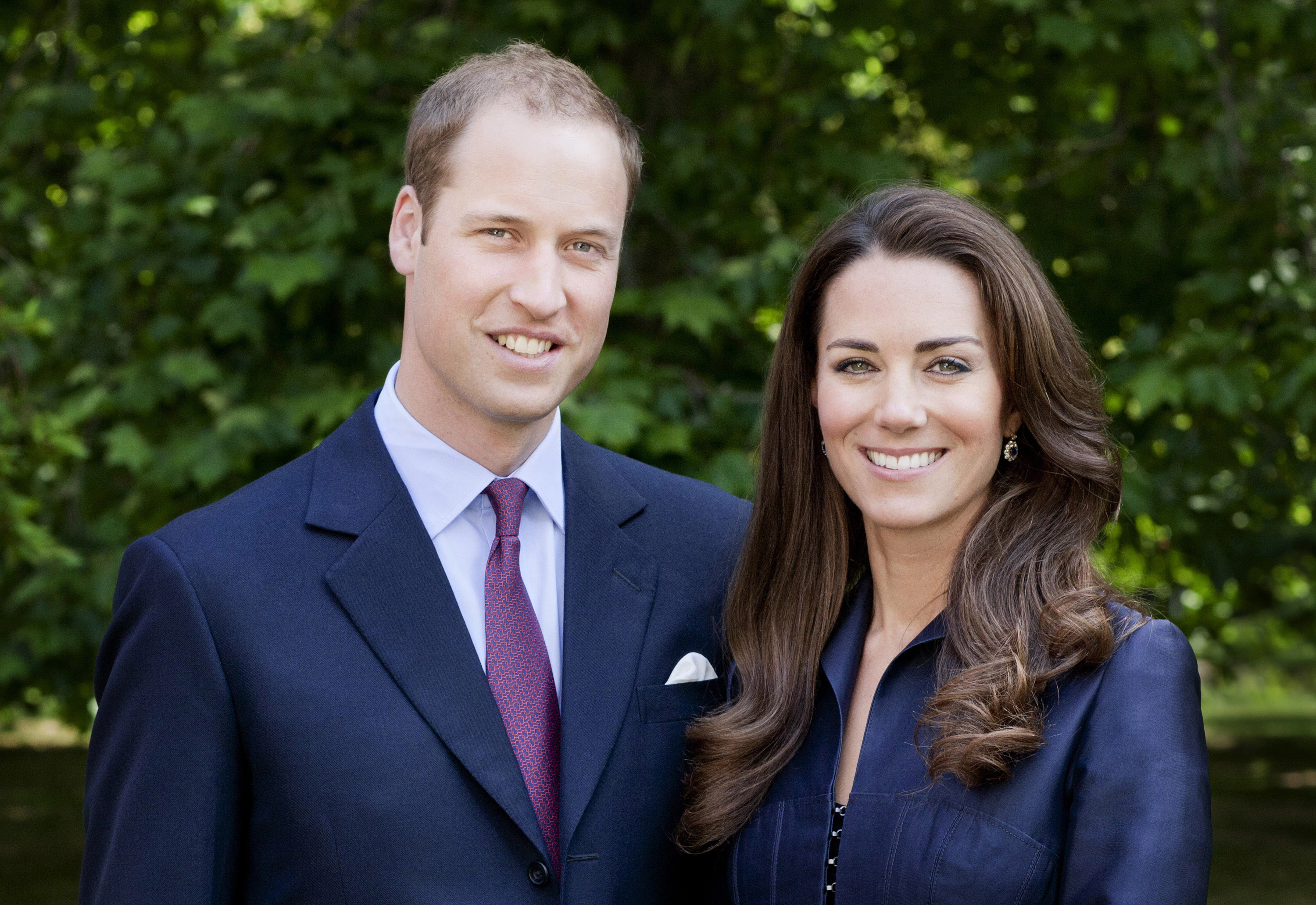 LONDON, UNITED KINGDOM - JUNE 3: (EDITORIAL USE ONLY) In this handout image supplied by St James's Palace, Prince William, Duke of Cambridge and Catherine, Duchess of Cambridge pose for the official tour portrait for their trip to Canada and California in the Garden's of Clarence House on June 3, 2011 in London. England. The newly married Royal Couple will be undertaking their first official joint tour to Canada and California from June 30th. The trip will begin with Canada Celebrations in Ottawa and include highlights such as the Calgary Stampede and a visit to Yellowknife. (Photo by Chris Jackson / Getty Images for St James's Palace)